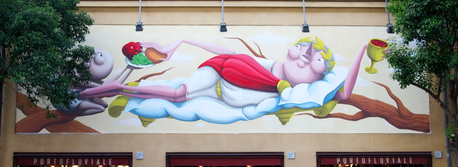 murales Mela Mundi all'entrata di porto fluviale